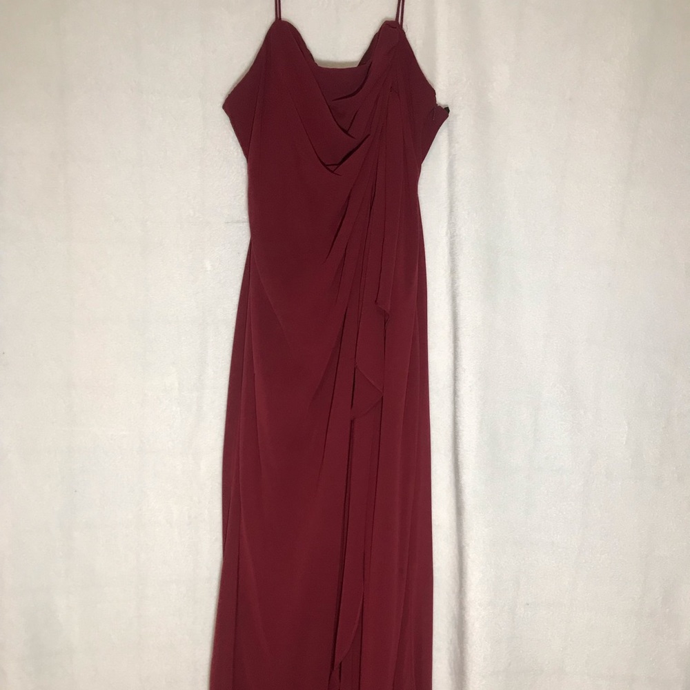 Long burgundy dress.
